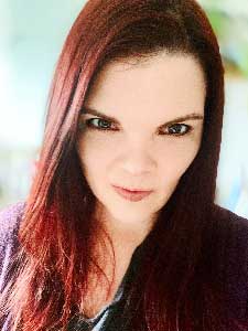 JoEllen Notte looking up at camera.