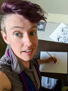 Tikva Wolf holding a pencil