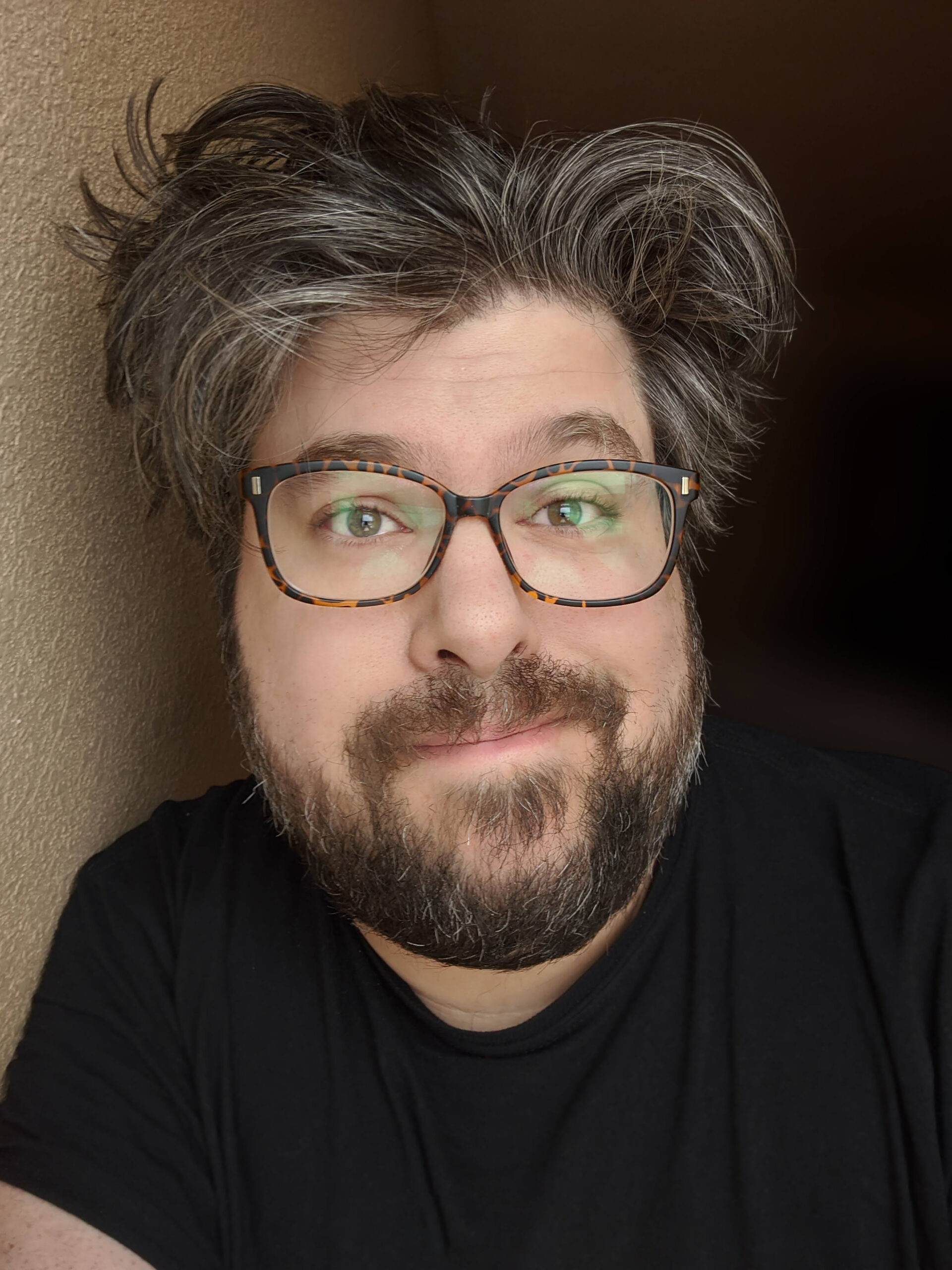 Cooper S. Beckett in black tshirt.